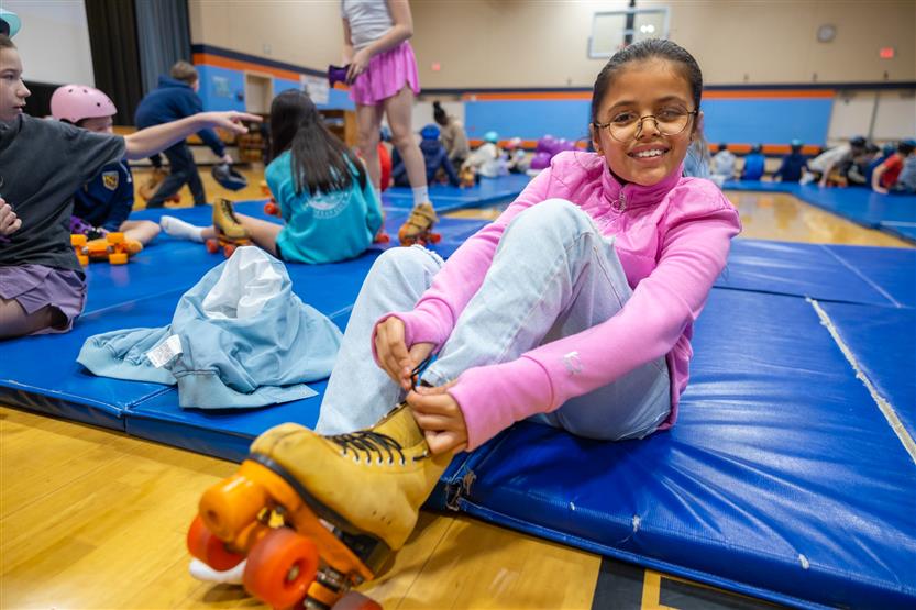 Students skate in PE